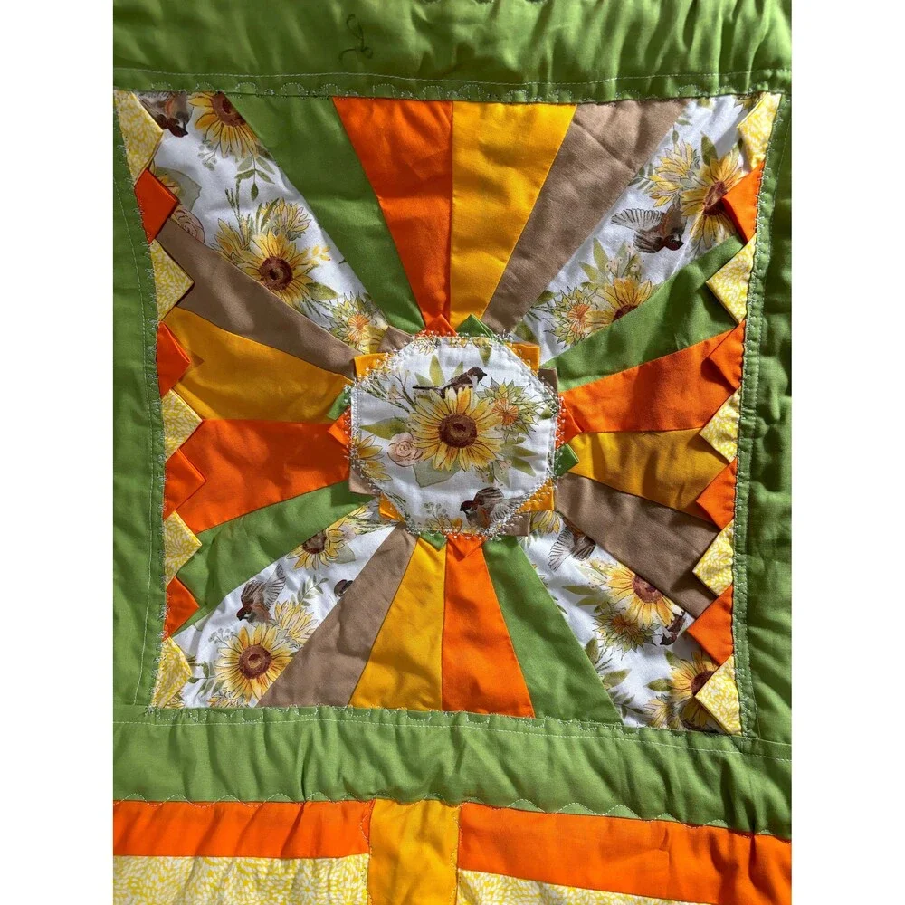 Cheerful,happy, colorful sunflower theme lap quilt or baby quilt. 41” x 40”